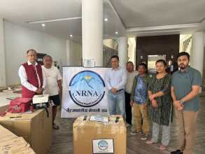 एनआरएनए जापानद्वारा माध्यमिक विद्यालयमा ५५ थान झोला  वितरण